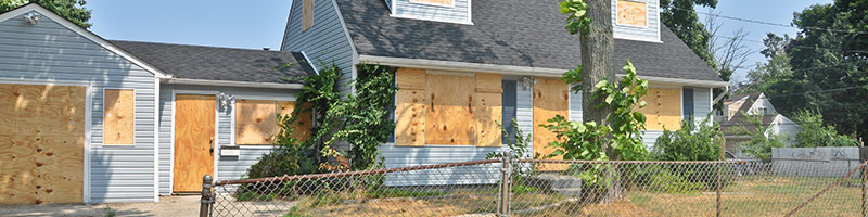 Boarded up house